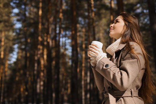 Women drinking coffee outside in the morning